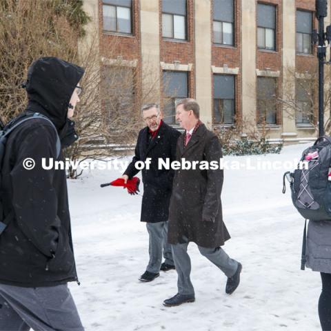 UNL Chancellor Ronnie Green and NU President Ted Carter walk across city campus during a winter-wind tour of UNL. January 17, 2020. Photo by Craig Chandler / University Communication.