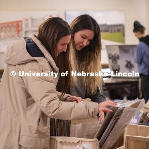 Sophomore Emily Schomburg from Kearney, and Junior Aylin Kanli from Calabasas, California look through posters at The UPC Nebraska Poster Sale in the City Campus Nebraska Union. January 28, 2020. Photo by Gregory Nathan / University Communication.