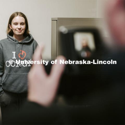 Grace Gawecki has her photo taken by Scott Hurst. She was a winner in the Husker Passport Giveaway sponsored by Education Abroad. January 30, 2020. Photo by Craig Chandler / University Communication.