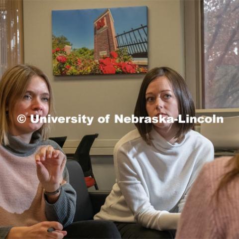 Rebecca Brock, assistant professor of psychology (in white), and graduate student Frannie Calkins (in pink and gray), interview a student. Their latest research suggests that even well-intentioned, healthy support — being helpful, encouraging and a good listener — can be counterproductive. Their research findings “The dark side of helping behaviors” was published in the Journal of Social and Personal Relationships. January 31, 2020. Photo by Gregory Nathan / University Communication.