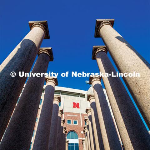 Looking through the columns and the east side of Memorial Stadium. City Campus. April 25, 2020. Photo by Craig Chandler / University Communication.