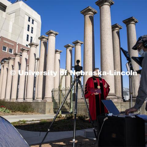 UCOMM’s video team, Curt Bright and Dave Fitzgibbon video Chancellor Ronnie Green as he delivers his virtual commencement remarks in front of the columns at the production of the commencement show. April 25, 2020. Photo by Craig Chandler / University Communication.