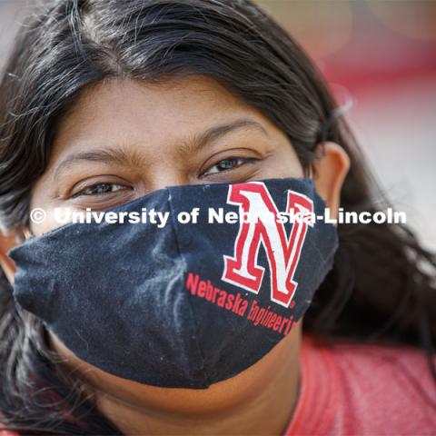 Sunandita Sarker, PhD student in mechanical engineering, wears a protective mask she made from one of her engineering t-shirts. May 28, 2020. Photo by Craig Chandler / University Communication.