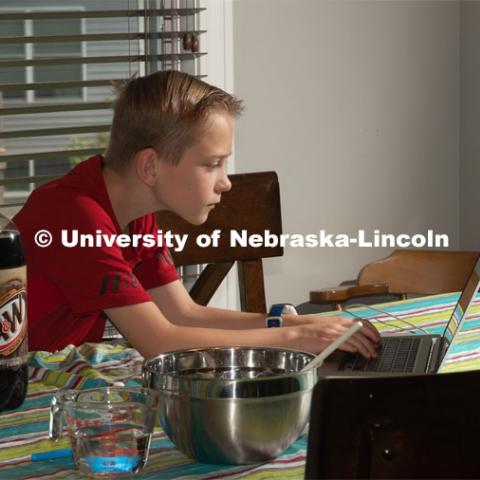 Evan Washburn of Lincoln, participates in the "Virtual Vibes" 4-H Camp. Camp participants receive a box that includes everything they need to complete a fun, hands-on activity. Kits include lesson plans and activity guides for youth ages 8-11 and 11-14. June 2, 2020. Photo by Gregory Nathan / University Communication.