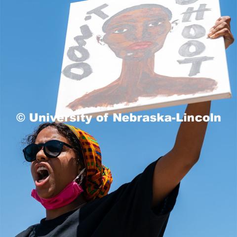 Batool Ibrahim leads protestors in chants outside of Andersen Hall on Saturday, June 13th, 2020, in Lincoln, Nebraska. Black Lives Matter Protest. Photo by Jordan Opp for University Communication.