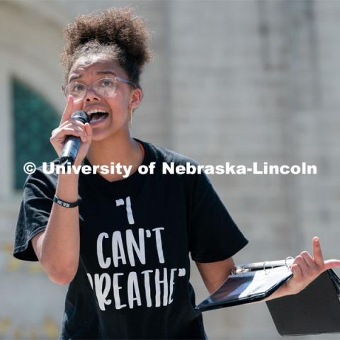 Marshawna Kapke recites a poem to the crowd of protestors outside the Nebraska State Capitol on Saturday, June 13th, 2020, in Lincoln, Nebraska. Black Lives Matter Protest. Photo by Jordan Opp for University Communication.