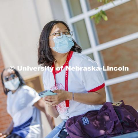 Sandhya Karki wears a mask. Photo shoot of students wearing masks and practicing social distancing. June 24, 2020. Photo by Craig Chandler / University Communication.