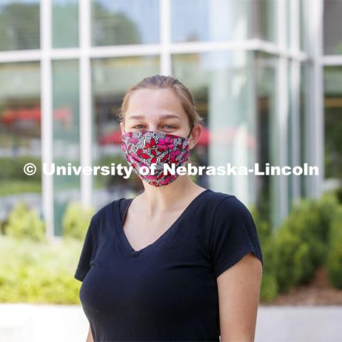Drea Poole, a senior in Global Studies, Women's and Gender Studies wears a mask. Photo shoot of students wearing masks and practicing social distancing in dining services in Willa Cather Dining Center. July 1, 2020. Photo by Craig Chandler / University Communication.