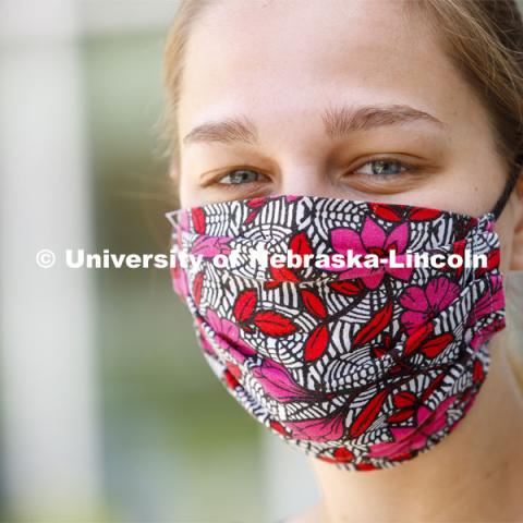 Drea Poole, a senior in Global Studies, Women's and Gender Studies wears a mask. Photo shoot of students wearing masks and practicing social distancing in dining services in Willa Cather Dining Center. July 1, 2020. Photo by Craig Chandler / University Communication.