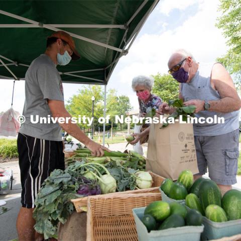 Vendors selling their produce at the Fallbrook Farmers Market in northwest Lincoln, Nebraska. July 23, 2020. Photo by Gregory Nathan / University Communication.