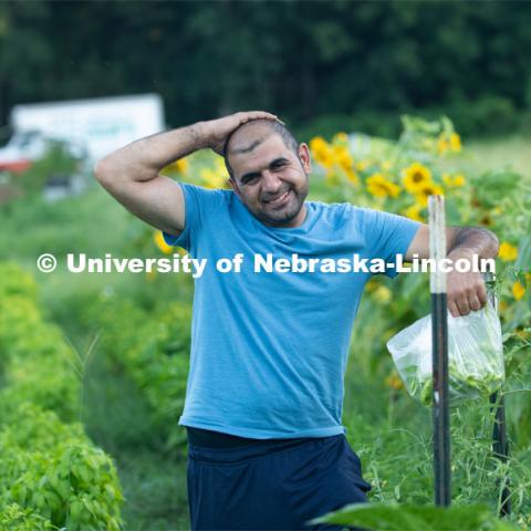 Lincoln families work their garden area at Prairie Pines in east Lincoln. July 27, 2020. Photo by Gregory Nathan / University Communication.