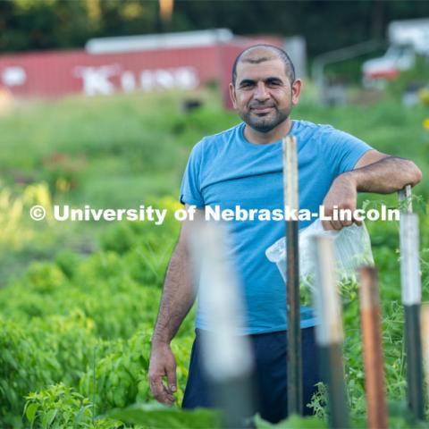 Lincoln families work their garden area at Prairie Pines in east Lincoln. July 27, 2020. Photo by Gregory Nathan / University Communication.