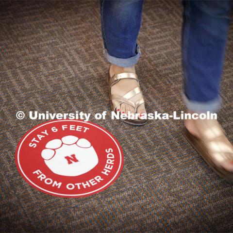 Stickers with elephant feet help patrons keep social distancing in the museum. The Nebraska State Museum in Morrill Hall will open August 5 with new procedures to keep patrons healthy and safe. July 29, 2020. Photo by Craig Chandler / University Communication.