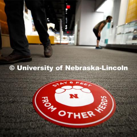 Stickers with elephant feet help patrons keep social distancing in the museum. The Nebraska State Museum in Morrill Hall will open August 5 with new procedures to keep patrons healthy and safe. July 29, 2020. Photo by Craig Chandler / University Communication.