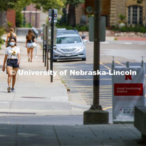 Anamaría Guzmán and Shridula Hegde walk through city campus. August 4, 2020. Photo by Craig Chandler / University Communication.