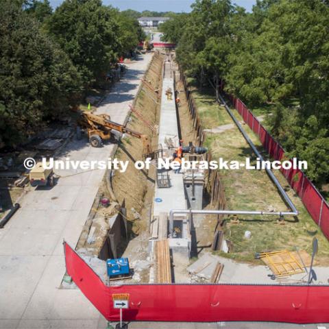 Facilities Planning and Construction will soon wrap up the overhaul of a nearly 500-foot steam tunnel that has resided on East Campus since the 1960s. Steam tunnel replacement project on East Campus. The tunnel runs north from the intersection of 38th Street and the East Campus Loop. August 6, 2020. Photo by Craig Chandler / University Communication.