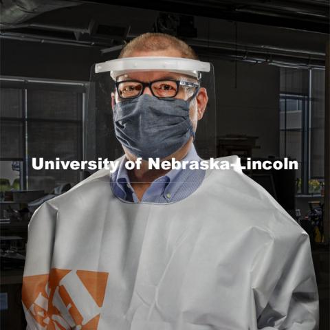 Bob Wilhelm, Vice Chancellor Research and Economic Development is wearing face shield and gown made at UNL. August 19, 2020. Photo by Craig Chandler / University Communication.