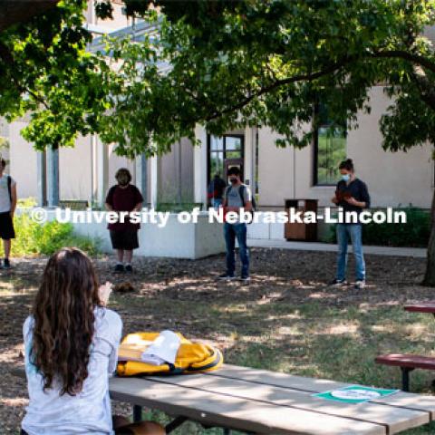 Students social distance and gather outside of Hardin Hall for the first day of in-person learning. Most years Professor Eric North teaches his Dendrology labs outside. August 24, 2020. Photo by Gregory Nathan / University Communication.