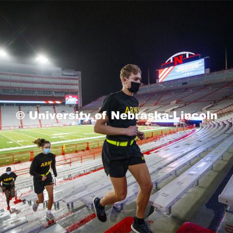 Army ROTC cadets climb the east stadium steps. UNL ROTC cadets and Lincoln first responders run the steps of Memorial Stadium to honor those who died on September 11. Each cadet ran more than 2,000 steps. September 11, 2020. Photo by Craig Chandler / University Communication.