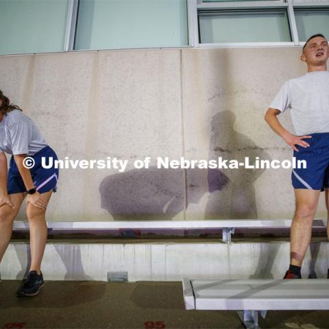 Air Force cadets Josie Svoboda and Ben Springer catch their breath at the top of the steps in north stadium. UNL ROTC cadets and Lincoln first responders run the steps of Memorial Stadium to honor those who died on 9/11. Each cadet ran more than 2,000 steps. September 11, 2020. Photo by Craig Chandler / University Communication.