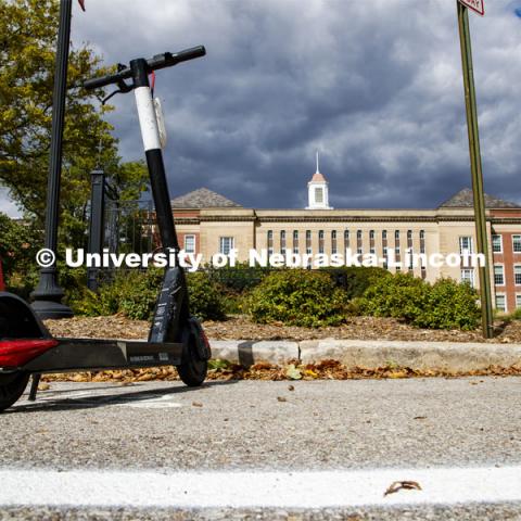 Scooters park in a designated area south of Love Library. September 28, 2020. Photo by Craig Chandler / University Communication.
