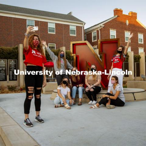 A group of Delta Delta Delta sorority sisters do a group photo in front of the “N” sculpture at the Wick Alumni Center. October 13, 2020. Photo by Craig Chandler / University Communication.