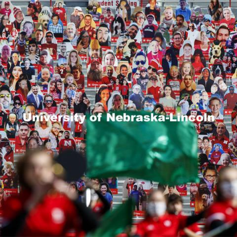 Cardboard cutouts of fans fill the stands in Memorial Stadium. Cornhusker Marching Band, Cheer Squad and Homecoming Royalty met in the empty Memorial Stadium to record performances that will air during Husker football games on the Big 10 Network during the upcoming season. October 18, 2020. Photo by Craig Chandler / University Communication.