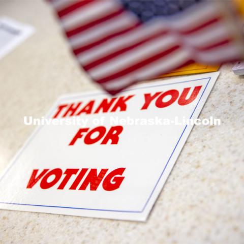 A sign on the table thanks voters for voting. Voting in the Nebraska Union for the 2020 Presidential Election. November 3, 2020. Photo by Craig Chandler / University Communication.