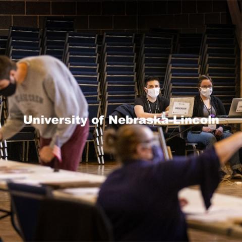 A team of engineers and political scientists, including University of Nebraska–Lincoln’s Jennifer Lather, is conducting research with the University of Rhode Island VOTES project to combat the problem of long wait times at election voting sites. Alberto Quesada and Abby Furr watch voters move through the polling station at Sower Church, 2640 R. Street. The students are helping research being done regarding polling places and how they can be optimized for voting quickly and efficiently. 2020 Presidential Election. November 3, 2020. Photo by Craig Chandler / University Communication.

