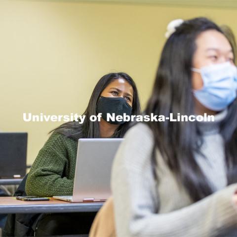 A student interacts with Professor Crystal Garcia during the CEHS Educational Administration class: College Students in America. November 10, 2020. Photo by Craig Chandler / University Communication.