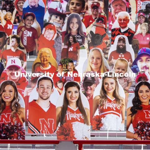 Members of the Husker Cheer Squad have front row seats for the home games. More than 6,000 corrugated plastic cutouts fill the lower level of east stadium, the tunnel walk, and part of north stadium to remind the Huskers who has the Greatest Fans in College Football. November 12, 2020. Photo by Craig Chandler / University Communication.