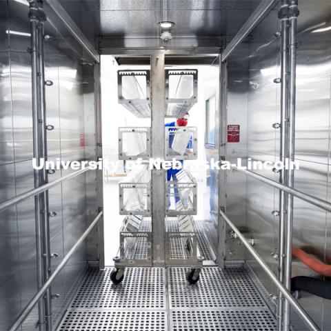 Jeffrey Price, research assistant professor of food science and associate director of the Nebraska Gnotobiotic Mouse Program, loads cages into a new washer at the university’s recently completed Gnotobiotic Mouse Facility. Photos of the new Gnotobiotic Mouse Facility - Nebraska Food for Health Center. November 19, 2020. Photo by Craig Chandler / University Communication.