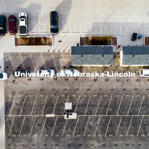 Participants in COVID testing at the newly built pods in the East Stadium parking lot.  The pods allow for both drive-through and walk-up testing. December 1, 2020. Photo by Craig Chandler / University Communication.