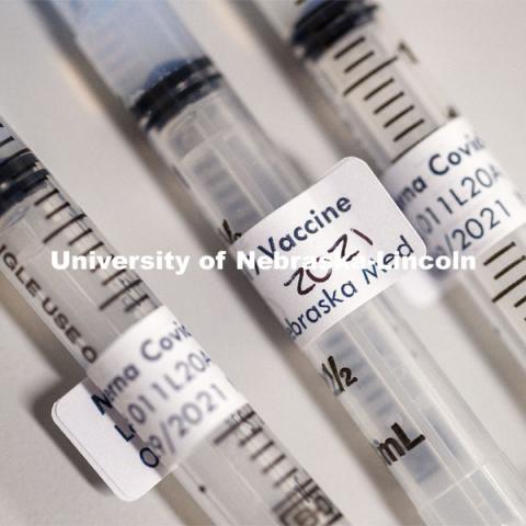 Syringes and vials of Moderna COVID-19 Vaccine. University Health Center and UNMC College of Nursing students, staff, and faculty receive their first COVID vaccine. January 29, 2021. Photo by Craig Chandler / University Communication.