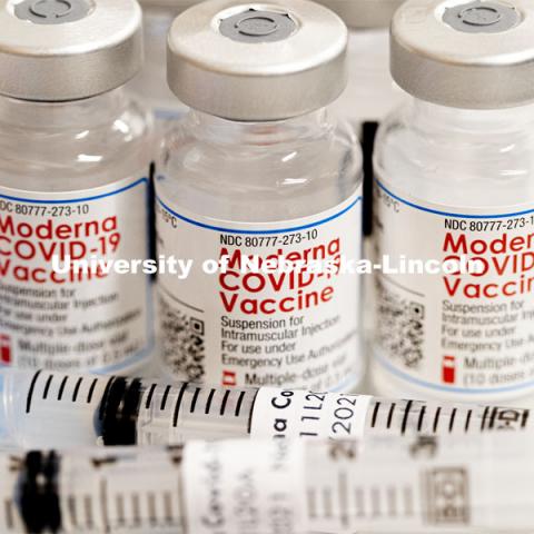 Syringes and vials of Moderna COVID-19 Vaccine. University Health Center and UNMC College of Nursing students, staff, and faculty receive their first COVID vaccine. January 29, 2021. Photo by Craig Chandler / University Communication.