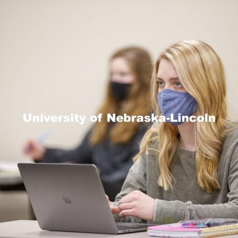 Students listen in a classroom as Roberto Stein teaches FINA 475 - Strategic Financial Management. February 2, 2021. Photo by Craig Chandler / University Communication.