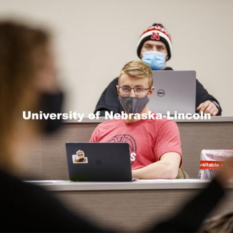 Amanda Gonzales’ ACCT 455 - Research and Communication in Accounting pairs off in person and on zoom to work on their project. February 9, 2021. Photo by Craig Chandler / University Communication.