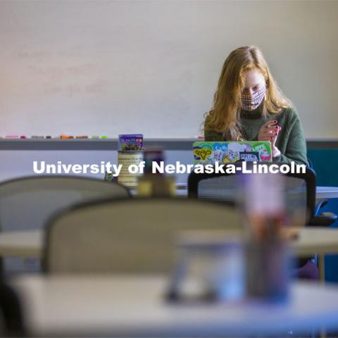 Madison Sides, junior in English, performs a writing center consultation over Zoom in the Writing Center in Andrews Hall. The physical space is closed to visitors, but any student or faculty member is able to utilize online appointments. February 18, 2021. Photo by Craig Chandler / University Communication.