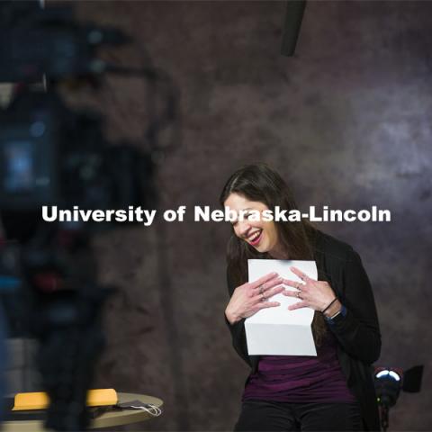 Karen Wills, University Program Council Nebraska Program Coordinator, reacts while reading a letter from one of her students. March 1, 2021. Photo by Craig Chandler / University Communication.