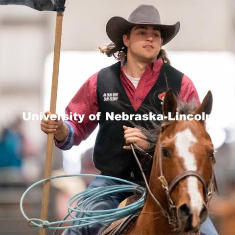 A member of the University of Nebraska rodeo team takes a lap around the track before the Nebraska Cornhusker College Rodeo at the Lancaster Event Center. April 24, 2021. Photo by Jordan Opp for University Communications.