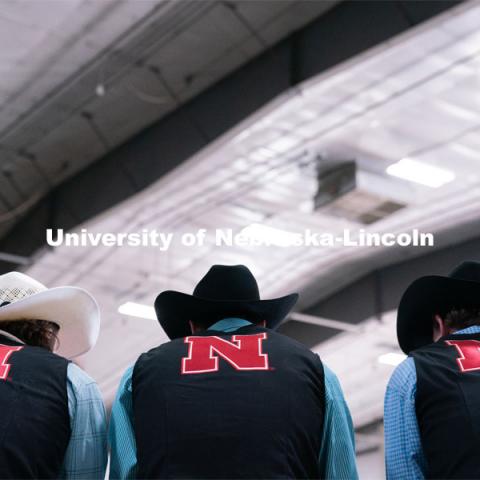 Members of the University of Nebraska rodeo team watches barrel racing event at the Nebraska Cornhusker College Rodeo at the Lancaster Event Center. April 24, 2021. Photo by Jordan Opp for University Communications.