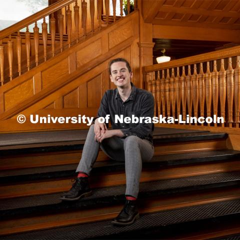 Aus Perez, landscape architecture major poses on the steps inside Architecture Hall for ASEM recruitment feature story. May 5, 2021. Photo by Craig Chandler / University Communication.  