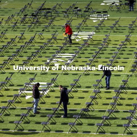 Chairs are set up on Tom Osbourne Field in Memorial Stadium for Saturday’s commencement. May 6, 2021. Photo by Craig Chandler / University Communication.