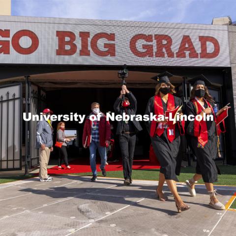 Graduates step on the field Saturday morning at the UNL Commencement in Memorial Stadium. May 8, 2021. Photo by Craig Chandler / University Communication.