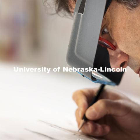 Francisco Souto works on a commissioned artwork in his Richards Hall studio. His intricate drawing will be unveiled in October. May 13, 2021. Photo by Craig Chandler / University Communication.  