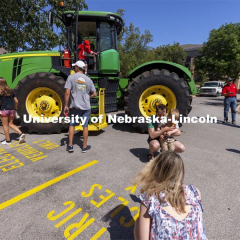 One of the tractors used to help test new tractor at the University of Nebraska Tractor Test Laboratory (NTTL) was the center of attention. The East Campus Discovery Days and Farmer’s Market at UNL is a fun, family-friendly event for all ages. It’s more than a farmer’s market. It’s more than a science day. Come for the hands-on, science-focused fun. Stay to enjoy live music and food trucks. Shop at our farmer’s market and vendor fair. June 12, 2021. Photo by Craig Chandler / University Communication.
