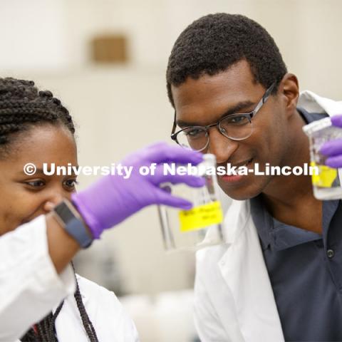 McNair scholar Seth Caines and summer research scholar Moriah Brown from Howard University work with Professor Shannon Bartlet-Hunt researching textiles as a source of microplastic fibers to Nebraska streams. June 22, 2021. Photo by Craig Chandler / University Communication.