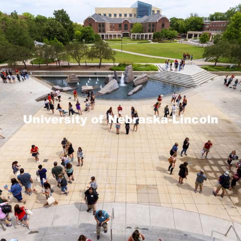 Parents and incoming students break into groups on the Nebraska Union Plaza as the afternoon session of New Student Enrollment begins. June 24, 2021. Photo by Craig Chandler / University Communication.