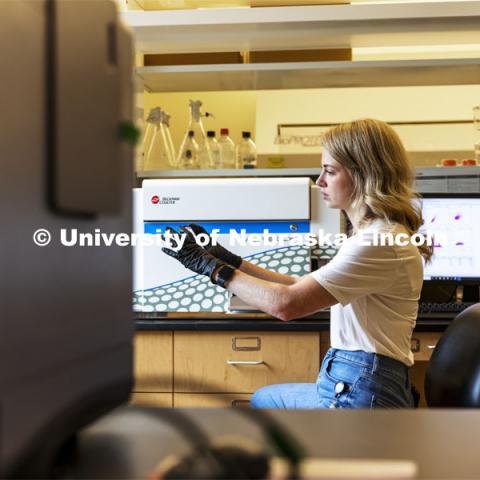 Graduate student Kari Heck places samples into a flow Cytometry analyzer in the Morrison Center for Virology. Nebraska Center for Biotechnology. June 25, 2021. Photo by Craig Chandler / University Communication.
