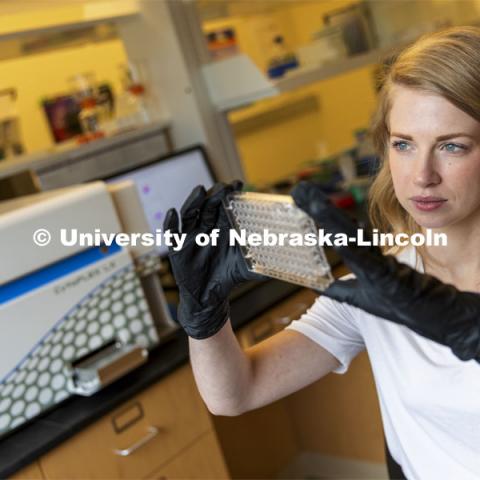 Graduate student Kari Heck places samples into a flow Cytometry analyzer in the Morrison Center for Virology. Nebraska Center for Biotechnology. June 25, 2021. Photo by Craig Chandler / University Communication.